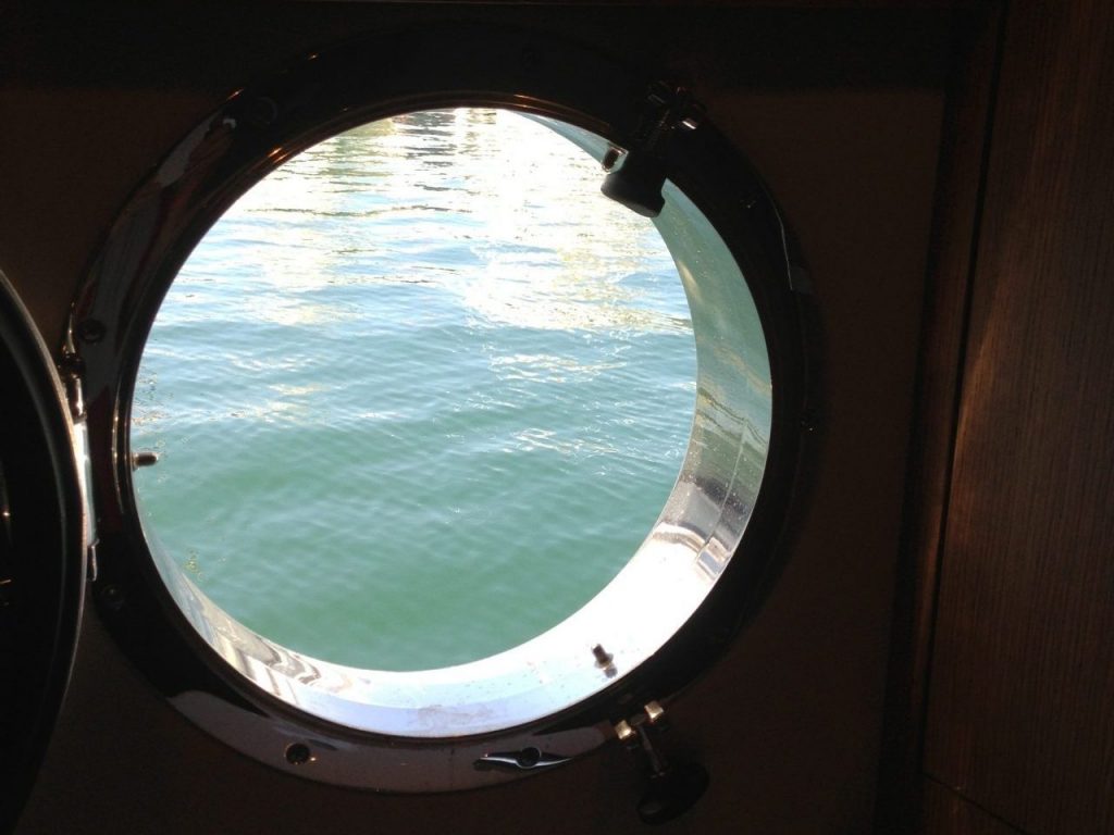 Porthole on Ferry Crossing Messina Strait, Italy (Birute Ranes)