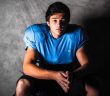 Calum Down-Jones in his newly-purchased football gear (Photo by Garrett Falke)