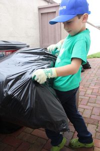 Ryan Hickman, 7, hard at work collecting recyclables for his business. ( Taya Buehler-Reagan)